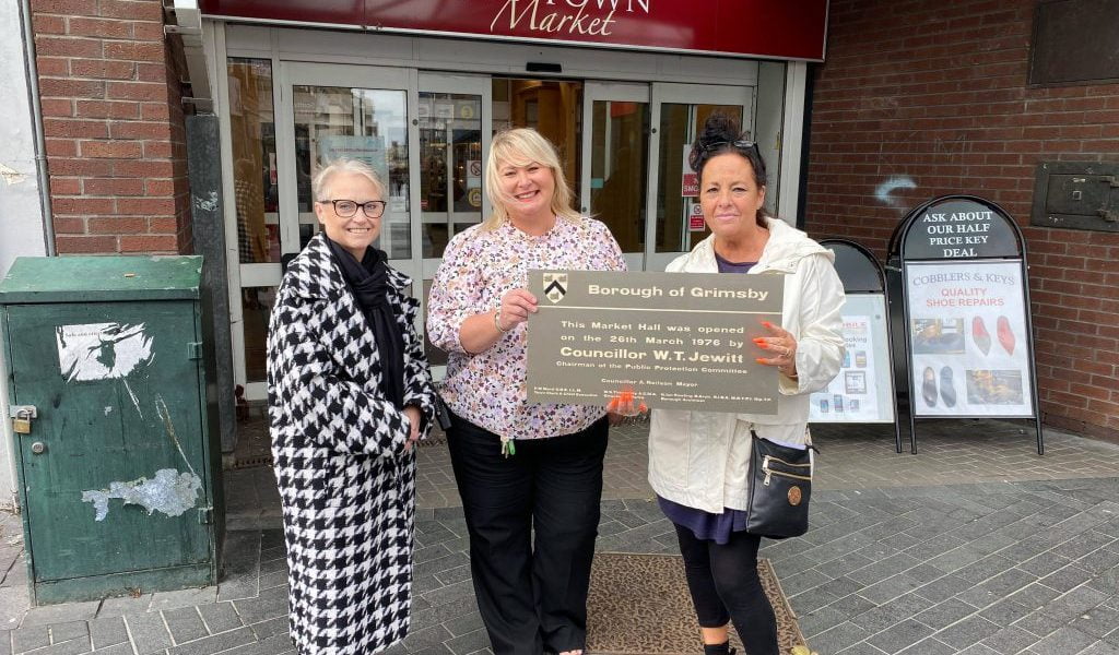 Top Town Market opening plaque