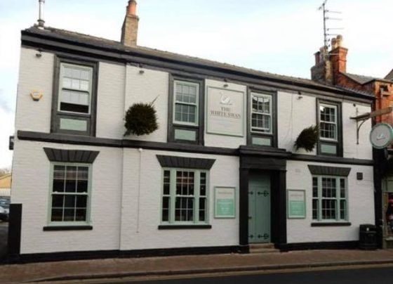 Armed robber holds bar staff at knifepoint