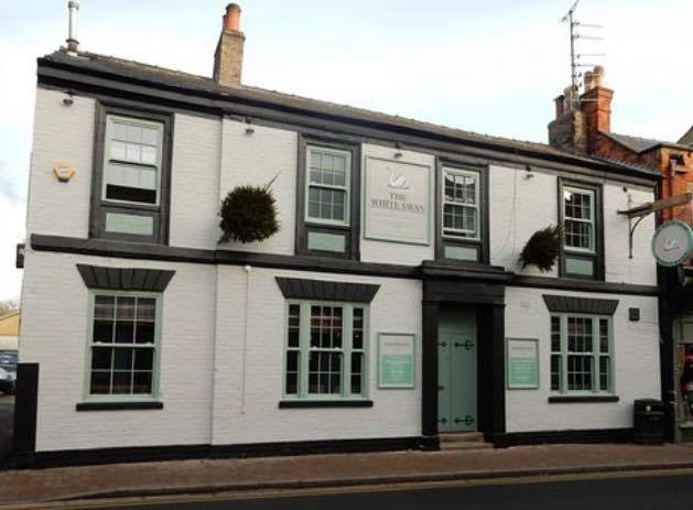 Armed robber holds bar staff at knifepoint